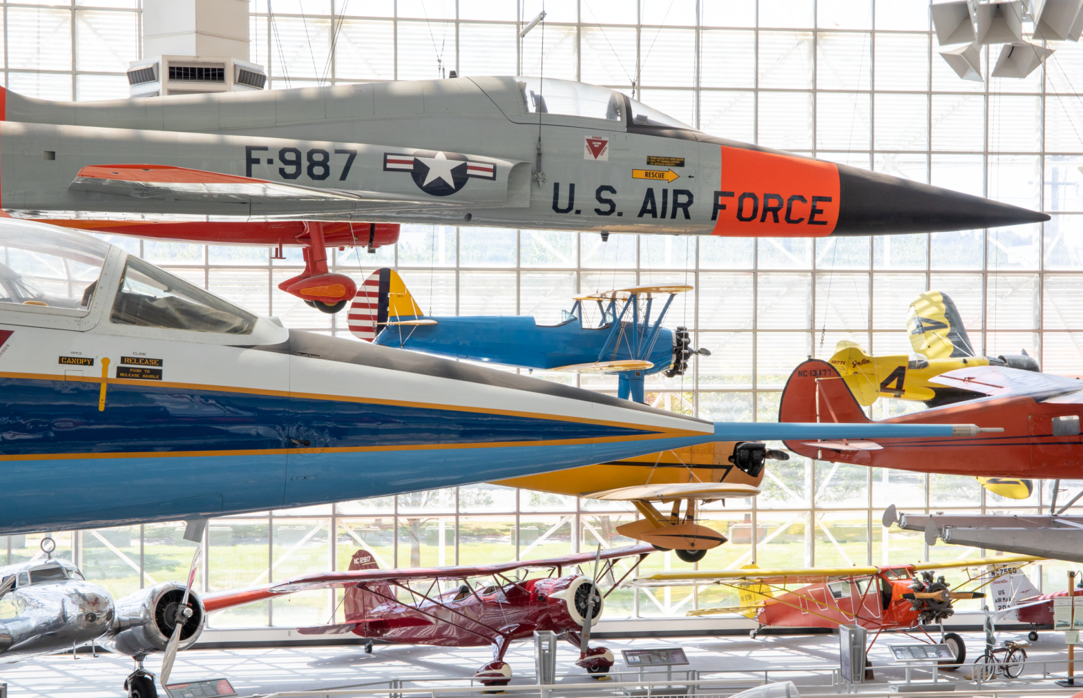 Airplanes displayed in a hangar